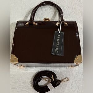 NWT La Terre Burgundy Patent Handbag with Gold Accents kisslock w/crossbody